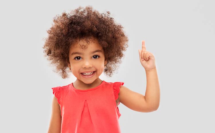 little african american girl pointing finger up