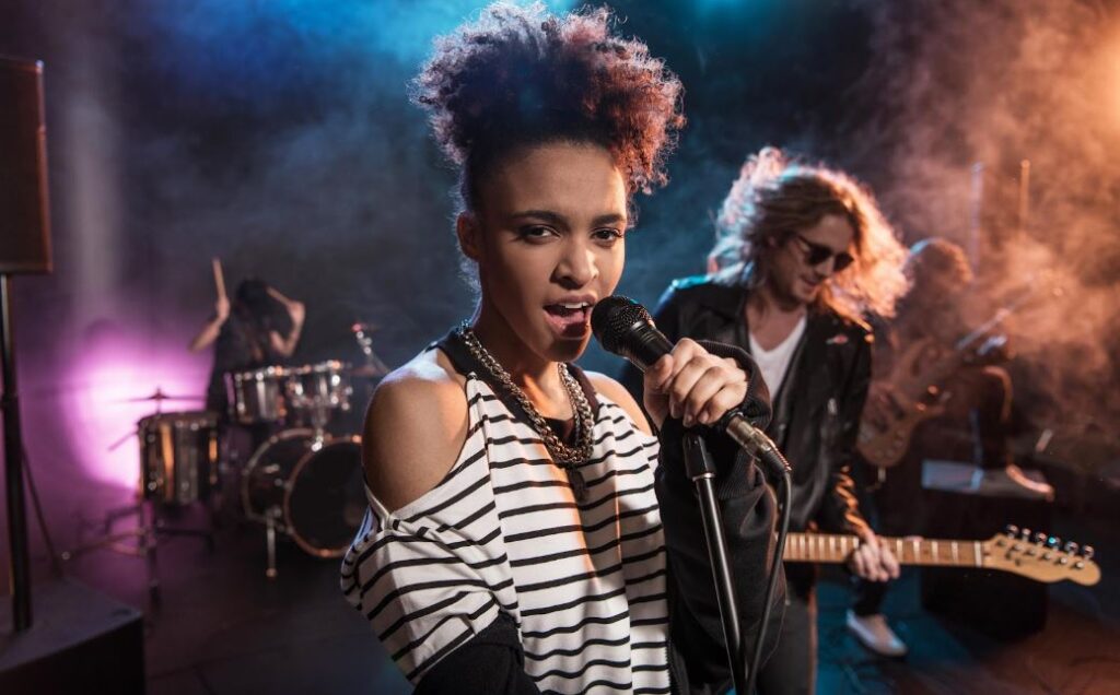 young girl singing on a live event