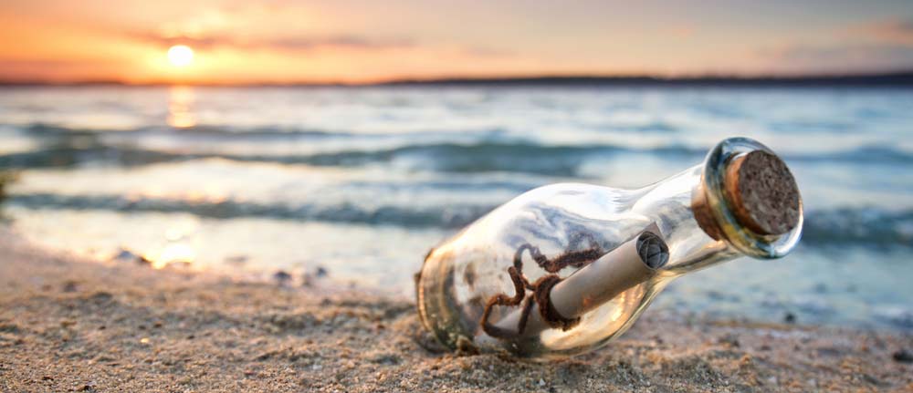 message in a bottle at the beach